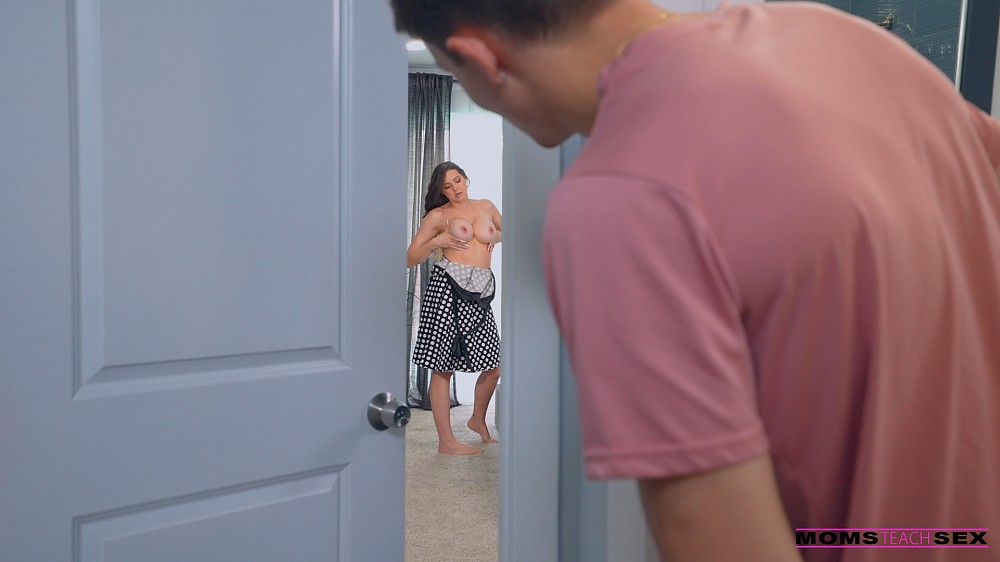 Busty Stepmom Sadie Holmes Gets Caught Oiling Up Before Her Big Date gallery image 5